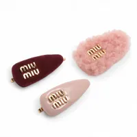 ミュウミュウ ロゴ 5IF188 スエード×パテント ヘアクリップ ピンク